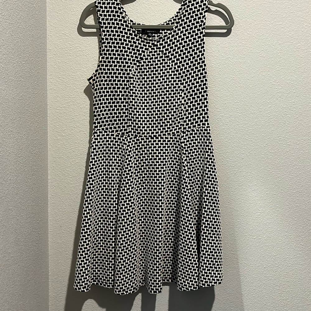 Black and white sleeveless dress, size medium, material is stretchy